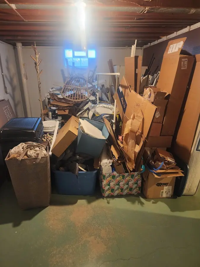 Roll-off dumpster container at job site for Yard Waste Dumpster Rental in Shelton